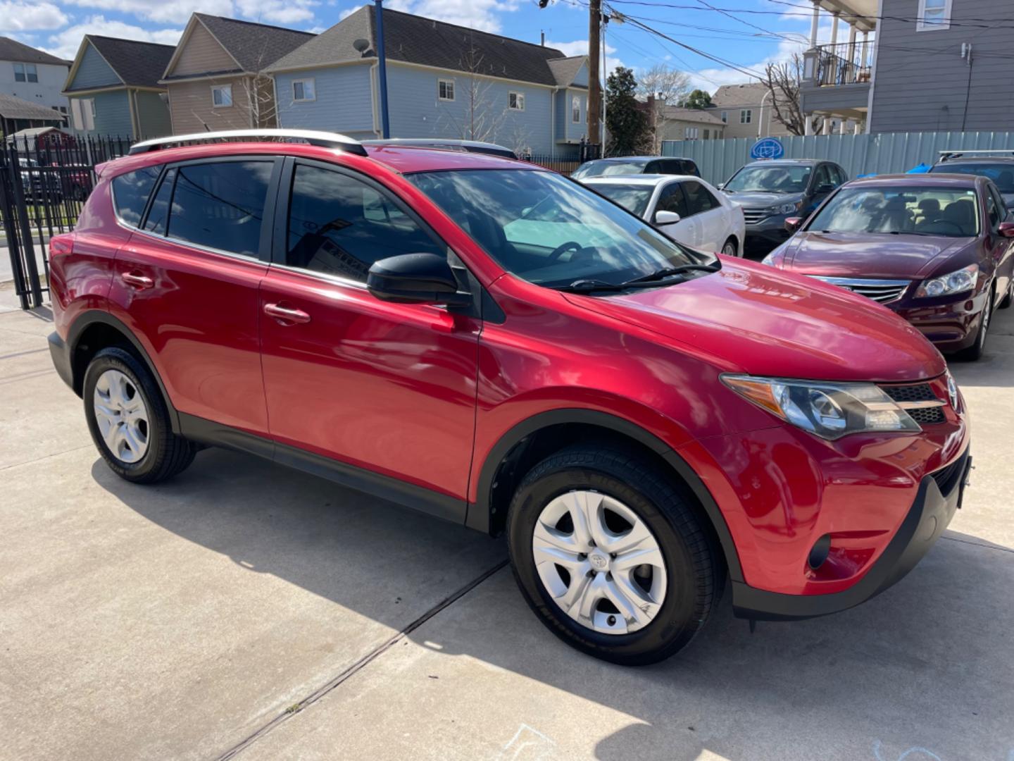 2013 Red /Silver Toyota RAV4 LE (2T3ZFREV0DW) with an 2.5L engine, Automatic transmission, located at 1501 West 15th St., Houston, 77008, (713) 869-2925, 29.797941, -95.411789 - Photo#1